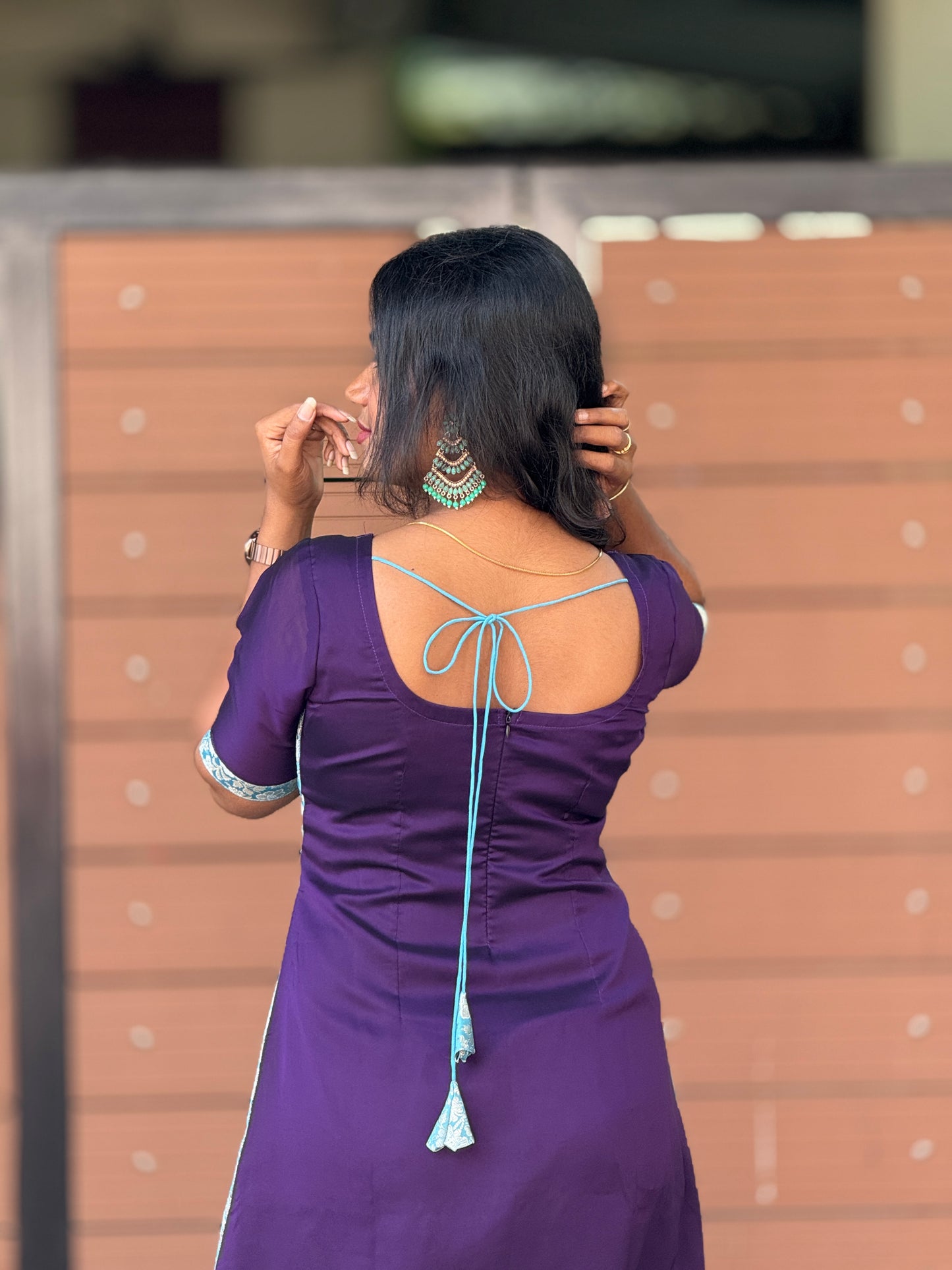 Purplela kurti